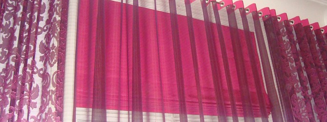 Luxusní apartmá s neméně luxusní dekorací oken